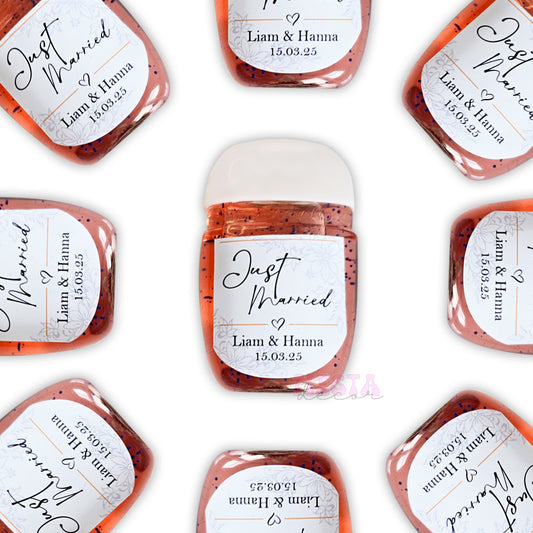 Personalized 'Just Married' wedding hand sanitizer favors with names, date, and pink speckled gel in clear bottles.
Custom wedding favors: Mini hand sanitizer bottles with elegant white labels and personalized details.
Wedding guest gifts: Pink speckled gel hand sanitizers with 'Just Married' custom labels for Liam & Hanna.